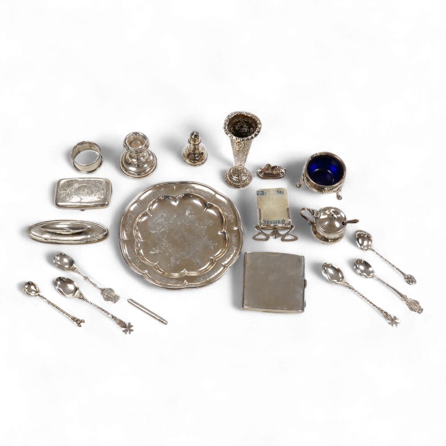 An early Victorian engraved silver plate, of cusped form, by Riley & Storer, London, 1844, with later engraved inscription, 17.5cm, together with two later silver cigarette cases, three silver condiments, a late Victoria